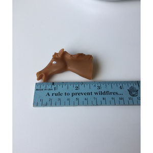 Plastic horse finger puppet